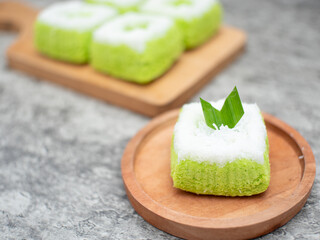 Putri Ayu is a sweet green cake topped with grated coconut, a popular Indonesian traditional food