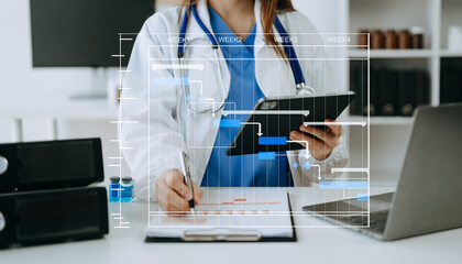 Project manager working and update tasks with Gantt chart scheduling diagram at hospital .success smart medical doctor working with smart medical doctor ..