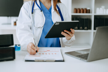 Medicine doctor hand working with modern digital tablet computer interface as medical network...