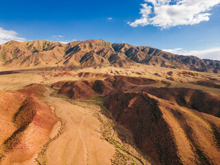 Beautiful landscape with Aerial view of Toktogul water reservoir in Kyrgyzstan. Mountains along...