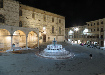 Cathedral and fountain in Perugia by night