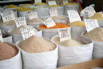 Bags of colorful spices at the Osh main market bazaar. The Osh Bazaar is the main market where the locals of Bishkek come to buy and sell their products.
