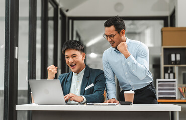 Serious young business asian man supervisor analyse financial report of responsible worker pay attention on mistakes propose correction. insurance agent legal obligations, policy terms conditions