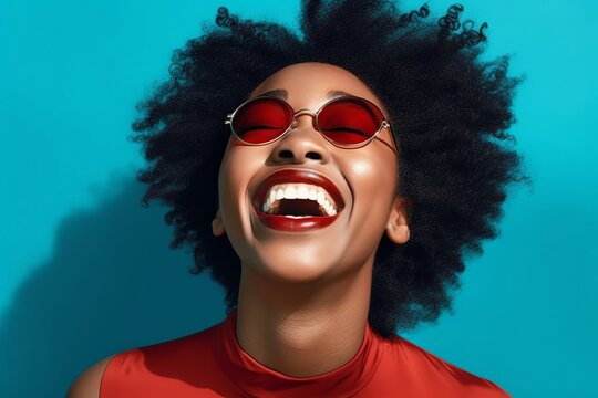 Vintage Vibes: Friends Laughing and Smiling Against Blue Background. Black Arts Movement Influence with Colorful, Eye-Catching Composition. Light Indigo and Amber Tones. High-Angle Capture