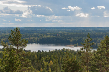 Fototapeta na wymiar View of lake and woodlands from a hill in Kangasala, Finland