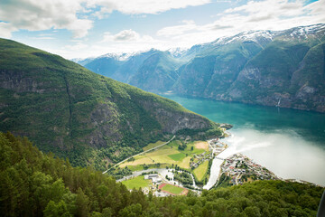 Naklejka na ściany i meble View from Stegastein viewpoint on the picturesque town of Flam in the Flomsdalen valley and Aurlandsfjord, Norway.