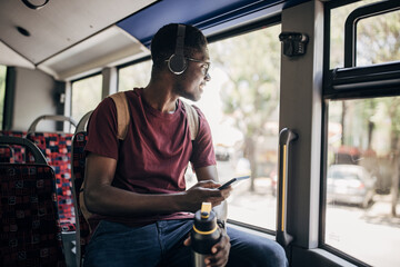 Young man in the public bus