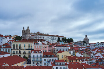 Fototapeta na wymiar Mosteiro de São Vicente de Fora and Church of Santa Engrácia, seen from the view-point of Miradouro das Portas do Sol in Alfama, Lisbon.