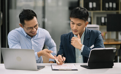 Male Operations Manager Holds Meeting Presentation for analysis graph company financial. People Work in Business Office.
