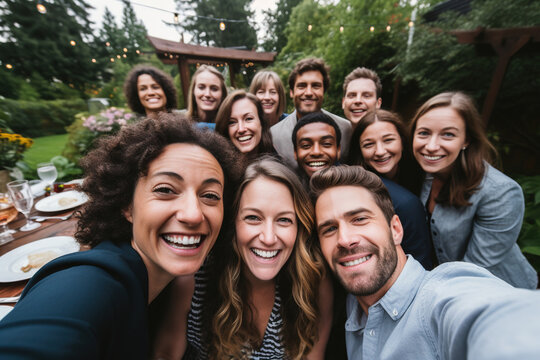 Group selfie at outdoor dinner party
