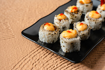 sushi is a Japanese dish of prepared vinegared rice, usually with some sugar and salt, accompanied by a variety of ingredients such as seafood, often raw and vegetables.