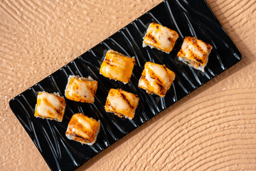 sushi is a Japanese dish of prepared vinegared rice, usually with some sugar and salt, accompanied by a variety of ingredients such as seafood, often raw and vegetables.