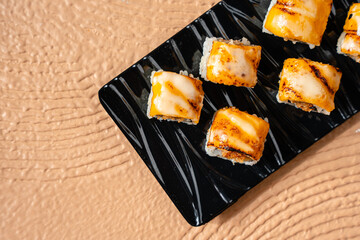 sushi is a Japanese dish of prepared vinegared rice, usually with some sugar and salt, accompanied by a variety of ingredients such as seafood, often raw and vegetables.