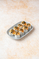 sushi is a Japanese dish of prepared vinegared rice, usually with some sugar and salt, accompanied by a variety of ingredients such as seafood, often raw and vegetables.