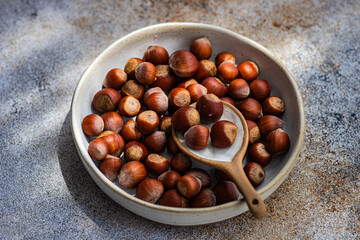Bowl of natural chestnuts in shells