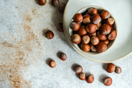 Bowl of natural chestnuts in shells