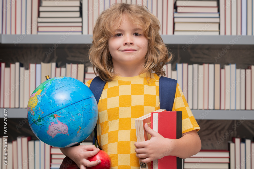 Poster school boy with world globe and books. back to school. funny little child from elementary school wit