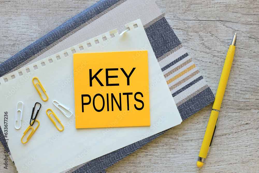 Poster yellow sticker with text on notebook key points