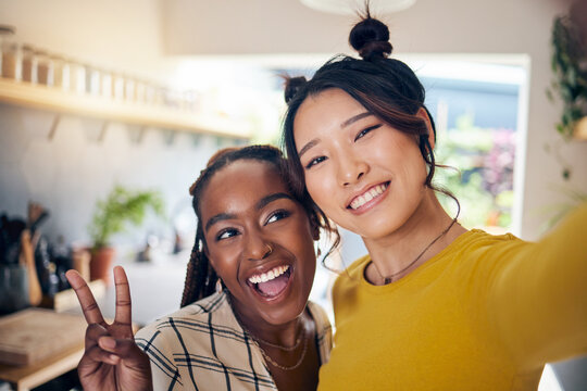 Peace sign, friends and selfie with woman in living room for social media, relax and diversity. Smile, happiness and profile picture with portrait of people at home for content creator and influencer