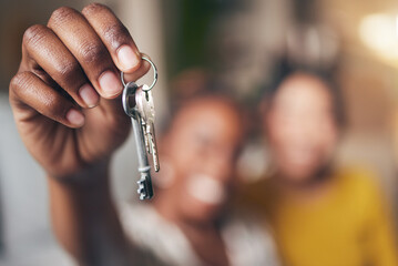 New home, hand and keys with people moving in together for real estate investment. Rent, mortgage and loan as homeowner celebrate at apartment, property or house with partner for freedom or security