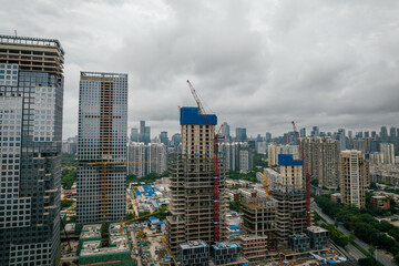 Shenzhen ,China - June 02 2022:  Aerial view of construction site and landscape  in Shenzhen city, China