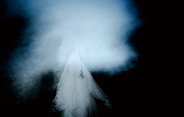scary ghost in foggy night Halloween background
