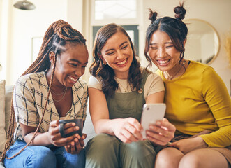 Happy, women with funny meme and smartphone, friends relax at home with social media and communication. Gen z, happiness and comedy online, chat and using phone with people on couch, app and tech