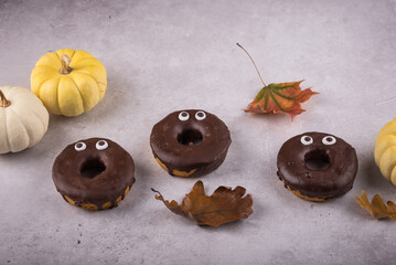 Halloween festive donuts with eyes.