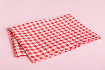 top view with red empty kitchen napkin isolated on table background. Folded cloth for mockup with copy space, Flat lay. Minimal style