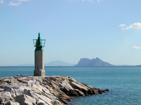Lighthouse with View over Gibraltar and Morocco over Mediterranean Sea in a Sunny Day From Sotogrande in Spain.