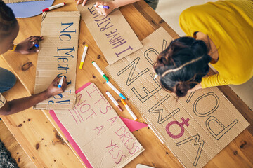 Girl group, sign and writing for protest, top view and support for diversity, power and goals in...