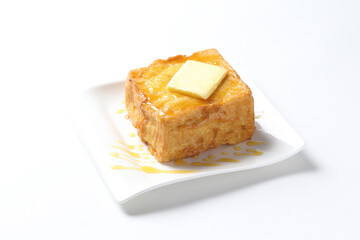 grilled egg french thick square baked toast w butter and honey jam snack breakfast in plate on white background western chef appetiser halal bakery food restaurant pastry menu for cafe