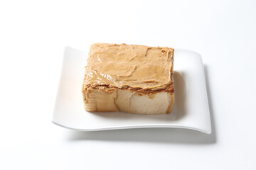 square peanut butter jam toast bread set with half boiled soft chicken egg and hot coffee or tea breakfast on white background asian chef appetiser halal bakery food restaurant pastry menu for cafe