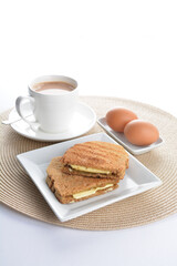 square butter kaya jam toast bread set with half boiled soft chicken egg and hot coffee or tea breakfast on white background asian chef appetiser halal bakery food restaurant pastry menu for cafe