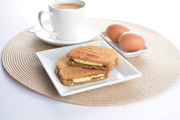 square butter kaya jam toast bread set with half boiled soft chicken egg and hot coffee or tea breakfast on white background asian chef appetiser halal bakery food restaurant pastry menu for cafe