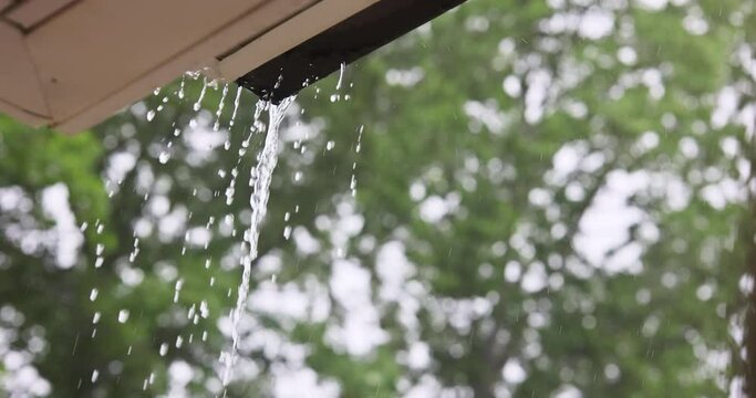 During heavy rain, water comes from over gutters