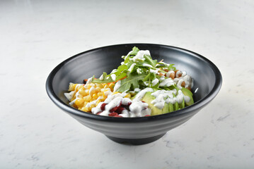 colourful healthy bowl assorted salad, vegetables, avocado, corn, bean, carrot rainbow salad...