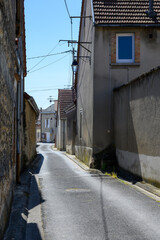 Walking in touristic old village Ambonnay, grand cru village for producing of sparkling wine champagne, France