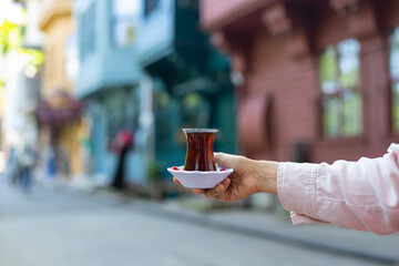 Turkish Tea (Türk Cayi) and Turkish Bagel(Turk Simit) in front of the Uskudar Streets Photo, Maidens Tower and Kuzguncuk, Üsküdar Istanbul, Turkey (Turkiye)