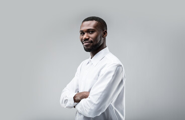Young black man, proud smile, confident