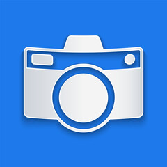 Paper cut Photo camera icon isolated on blue background. Foto camera icon. Paper art style. Vector