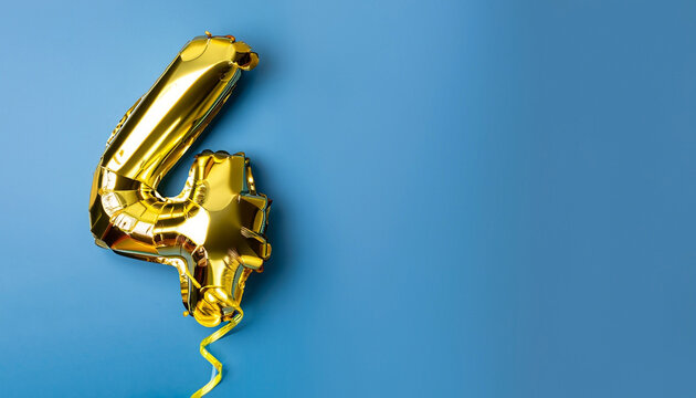 Banner with number 4 golden balloon with copy space. Four years anniversary celebration concept on a blue background.