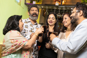 Indian people enjoying party at restaurant
