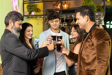 Indian people enjoying party at restaurant.