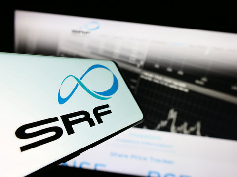 Stuttgart, Germany - 08-05-2023: Smartphone with logo of Indian chemicals company SRF Limited on screen in front of business website. Focus on center-right of phone display.