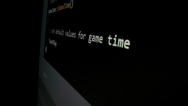 Closeup macro shot movement of coding script moving across LED screen with real-time AI-generated typing, showcasing advanced AI learning in optimization, debug and coding for software development.