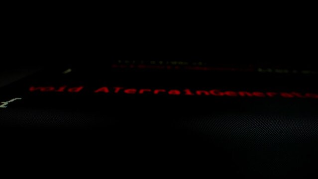Closeup macro shot movement of coding script moving across LED screen with real-time AI-generated typing, showcasing advanced AI learning in optimization, debug and coding for software development.