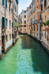 Picturesque Scene from Venice with the narrow water canals.