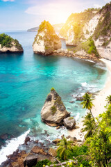 Tropical beach with white sand and palm trees, beach holiday destination on Bali island