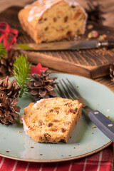 Traditional Christmas cake with candied fruit, raisins and fruits. Shallow depth of field.